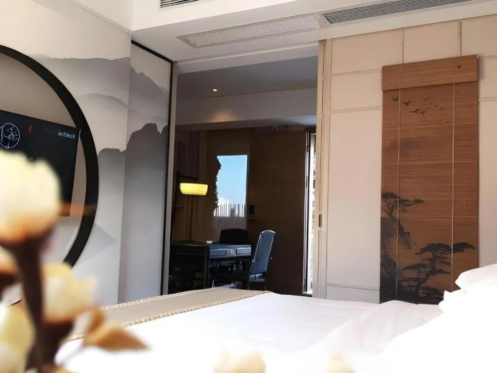 Bed in Yuan Culture Hotel Shenzhen World Shajing