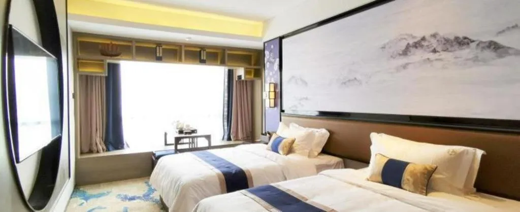 Bed in Yuan Culture Hotel Shenzhen World Shajing
