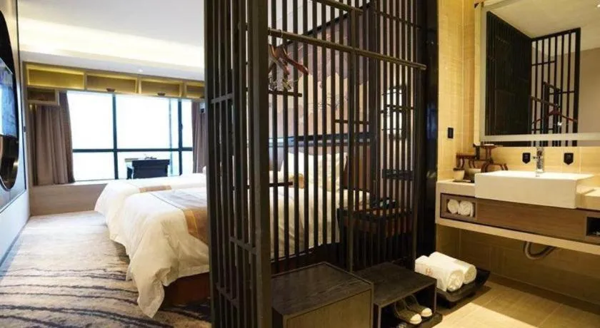 Bed in Yuan Culture Hotel Shenzhen World Shajing