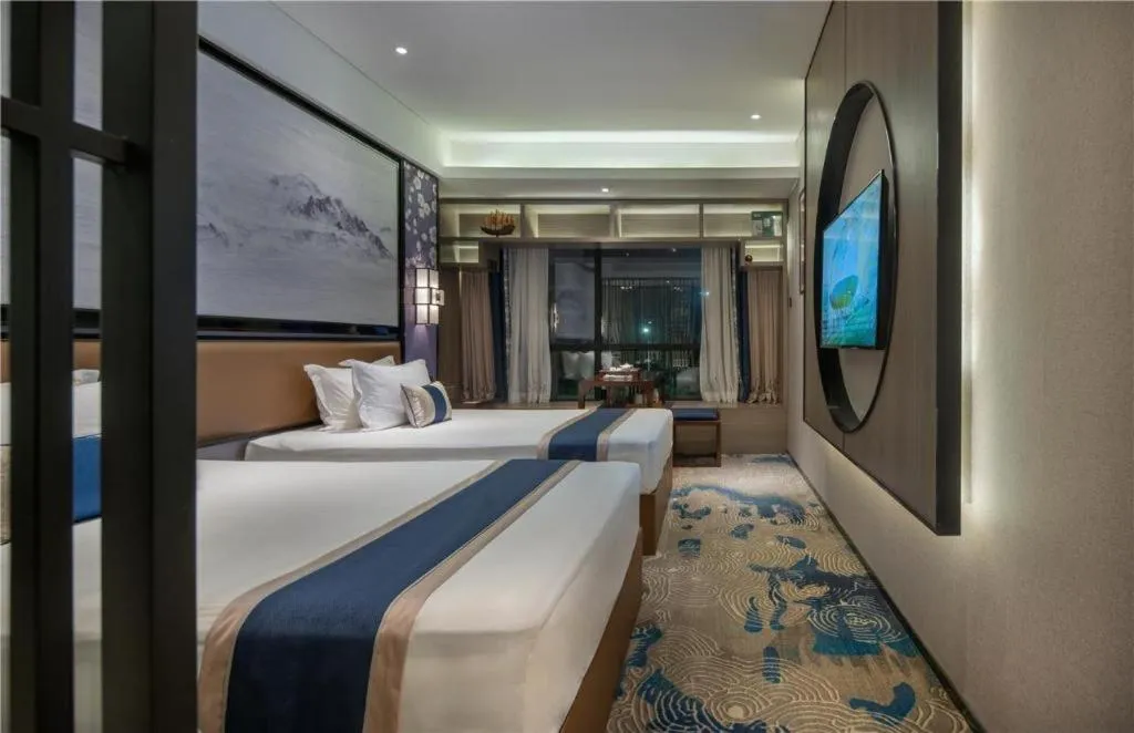 Bed in Yuan Culture Hotel Shenzhen World Shajing