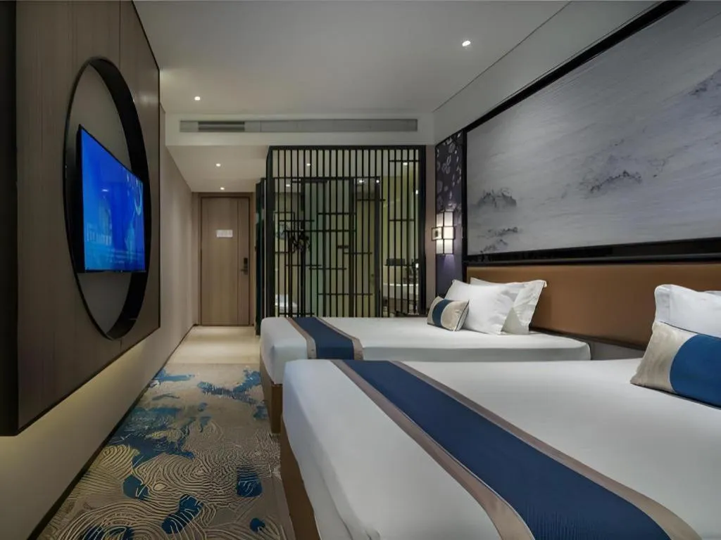 Bed in Yuan Culture Hotel Shenzhen World Shajing