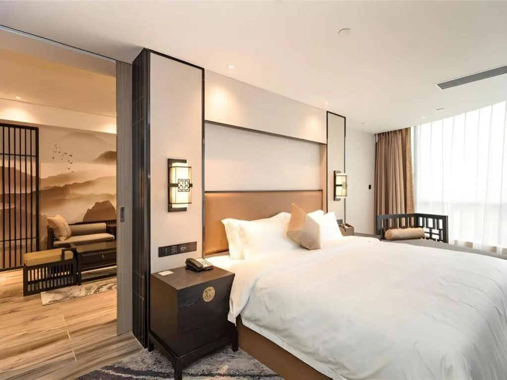 Bed in Yuan Culture Hotel Shenzhen World Shajing