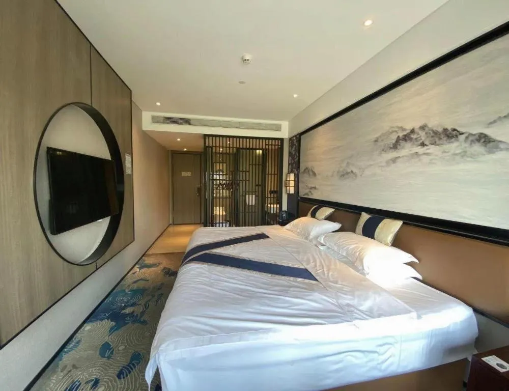 Bed in Yuan Culture Hotel Shenzhen World Shajing
