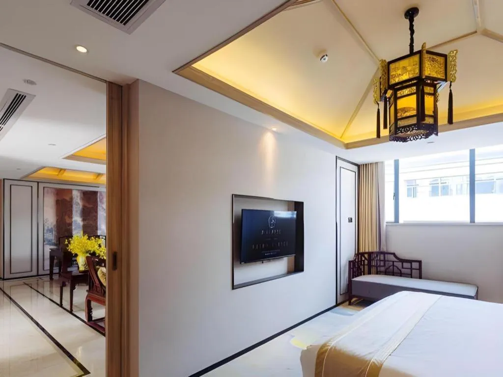 Bed in Yuan Culture Hotel Shenzhen World Shajing