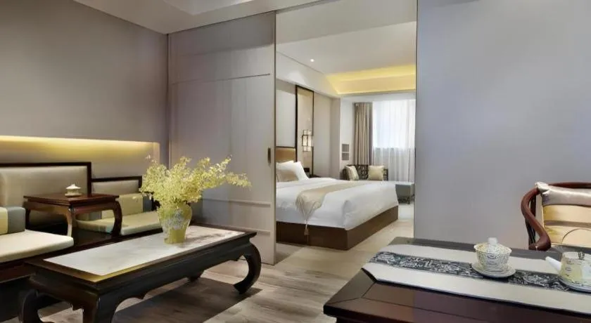 Bed in Yuan Culture Hotel Shenzhen World Shajing