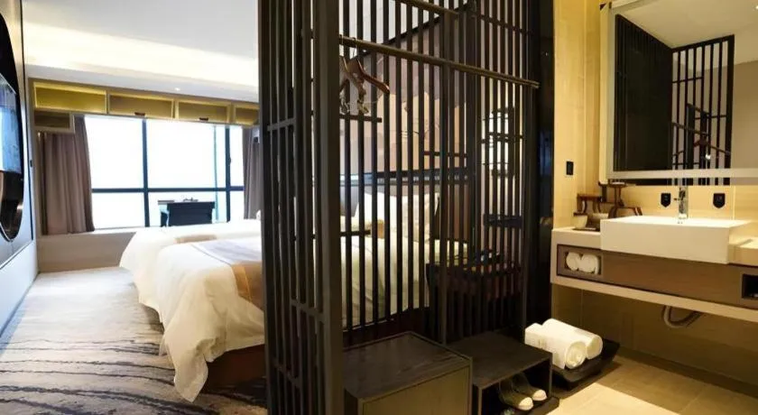 Bed in Yuan Culture Hotel Shenzhen World Shajing