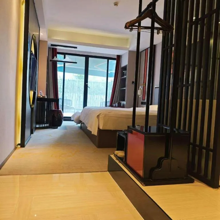 Bed in Yuan Culture Hotel Shenzhen World Shajing