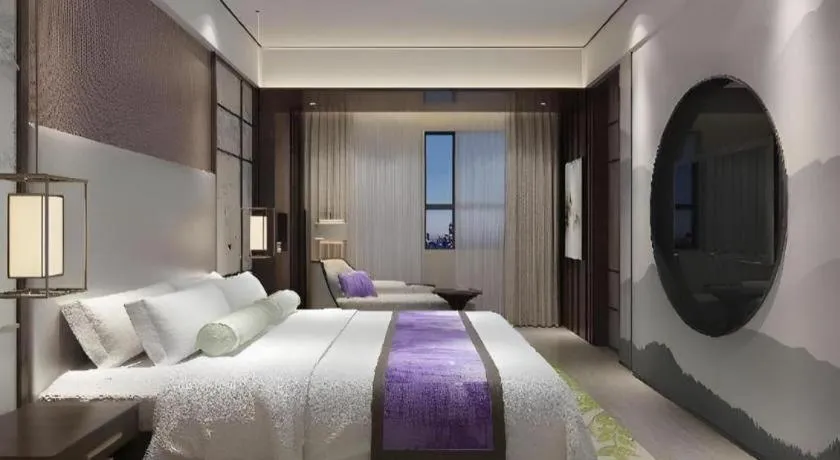 Bed in Yuan Culture Hotel Shenzhen World Shajing