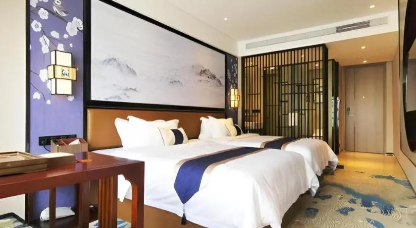Bed in Yuan Culture Hotel Shenzhen World Shajing