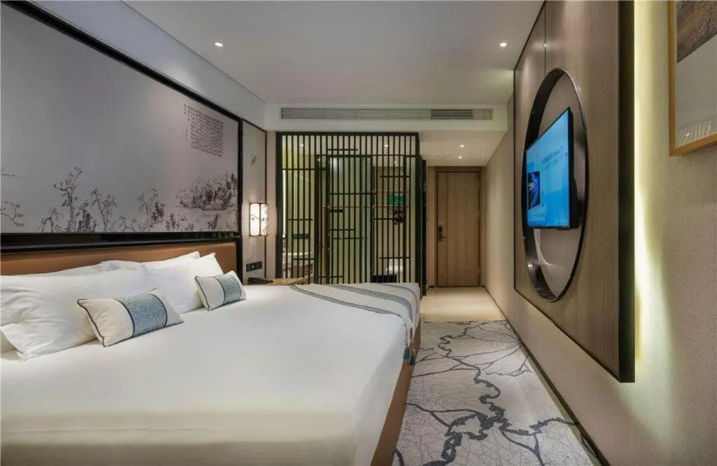 Bed in Yuan Culture Hotel Shenzhen World Shajing