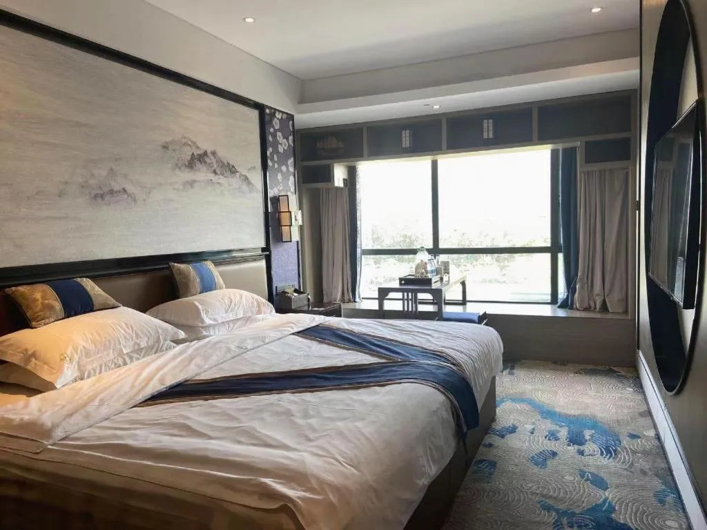 Bed in Yuan Culture Hotel Shenzhen World Shajing