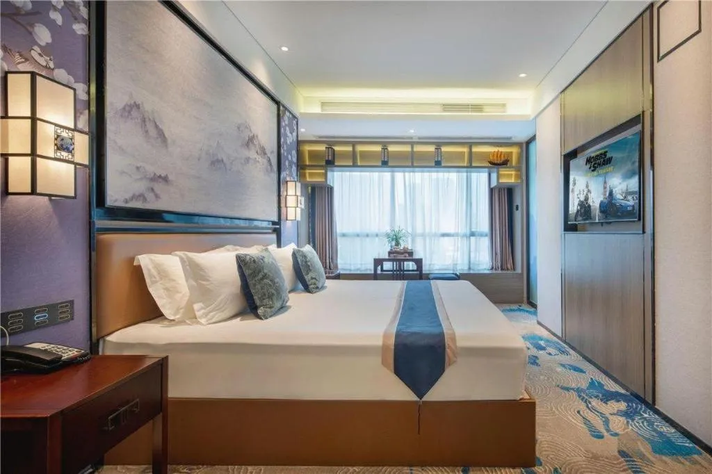 Bed in Yuan Culture Hotel Shenzhen World Shajing
