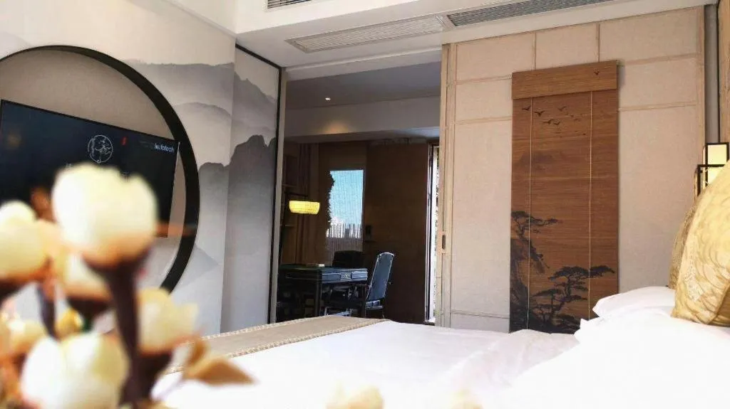 Bed in Yuan Culture Hotel Shenzhen World Shajing