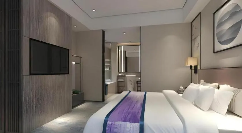 Bed in Yuan Culture Hotel Shenzhen World Shajing