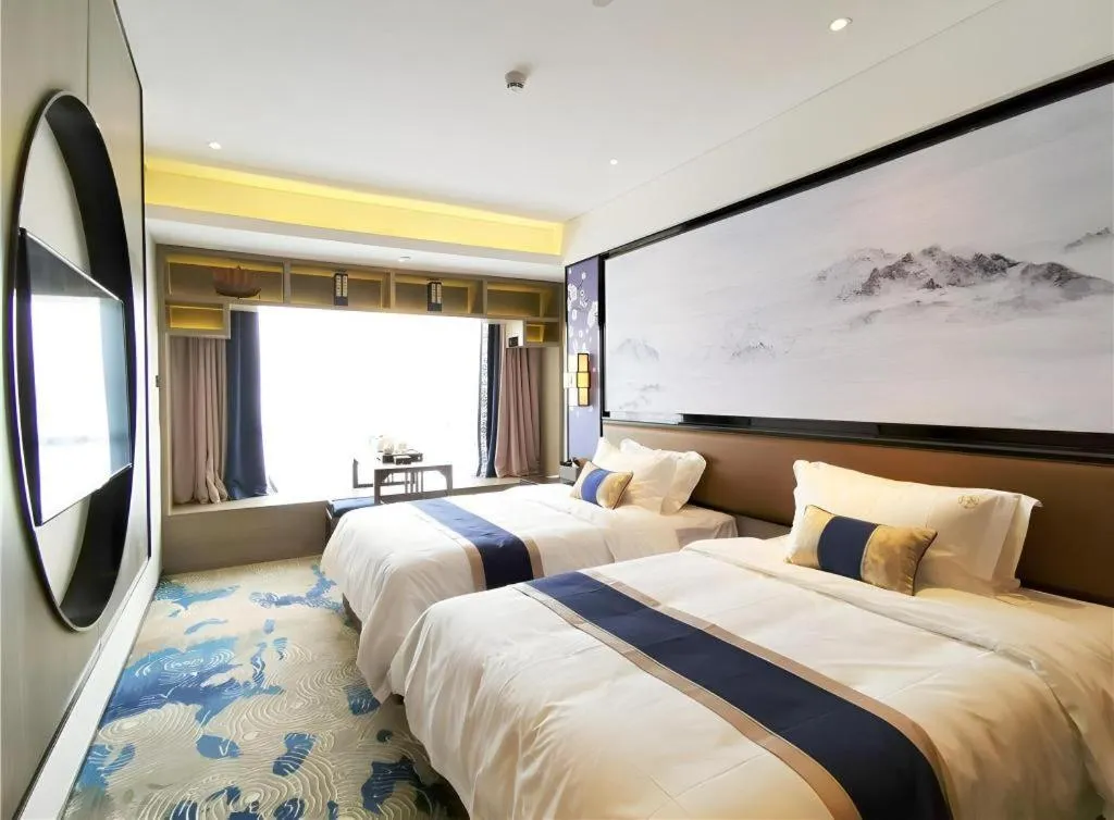 Bed in Yuan Culture Hotel Shenzhen World Shajing
