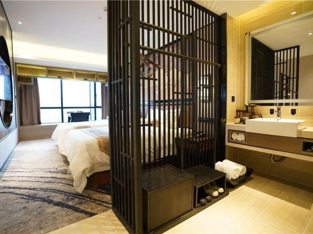 Bed in Yuan Culture Hotel Shenzhen World Shajing