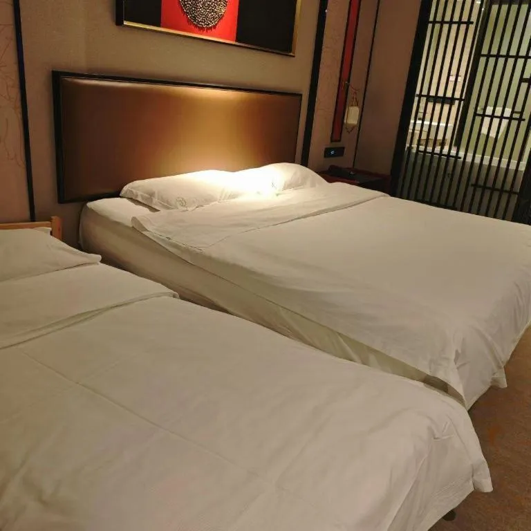 Bed in Yuan Culture Hotel Shenzhen World Shajing