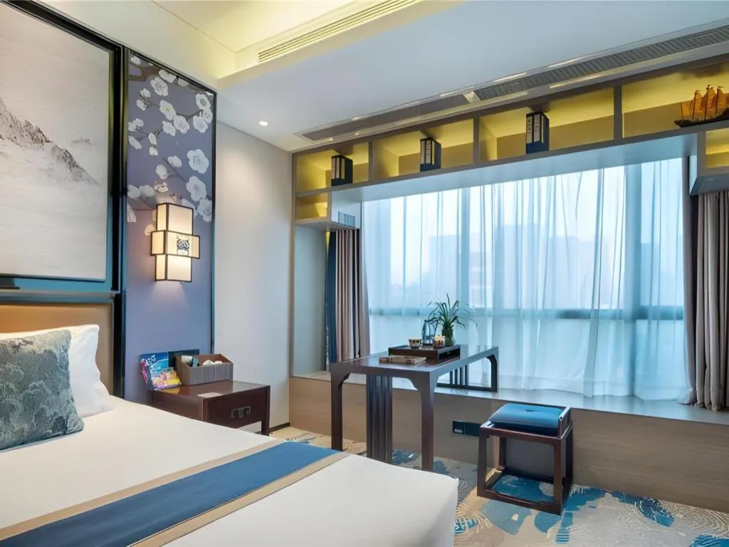 Bed in Yuan Culture Hotel Shenzhen World Shajing