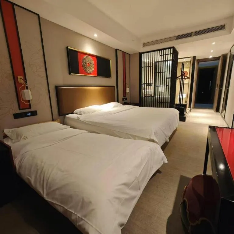 Bed in Yuan Culture Hotel Shenzhen World Shajing