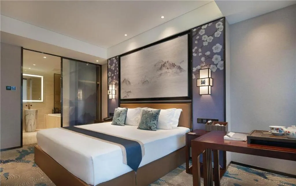 Bed in Yuan Culture Hotel Shenzhen World Shajing
