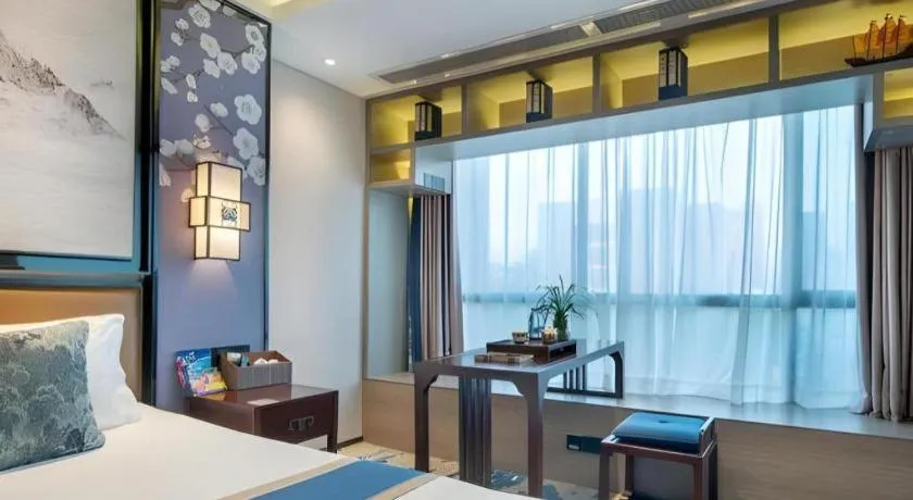 Bed in Yuan Culture Hotel Shenzhen World Shajing