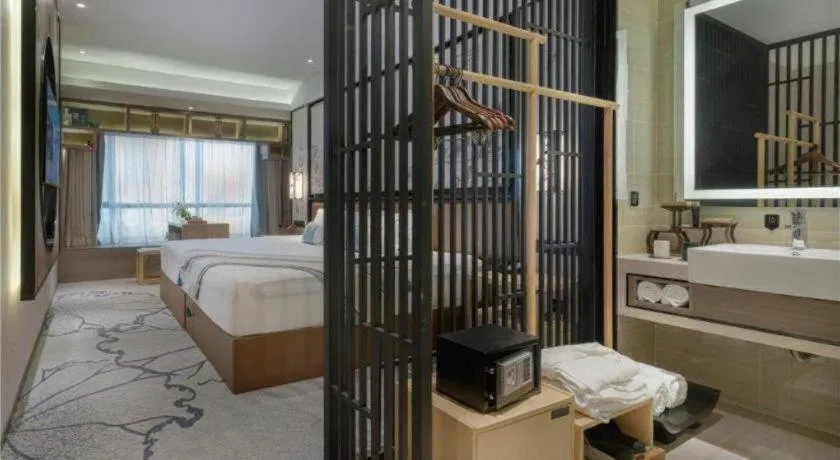 Bed in Yuan Culture Hotel Shenzhen World Shajing