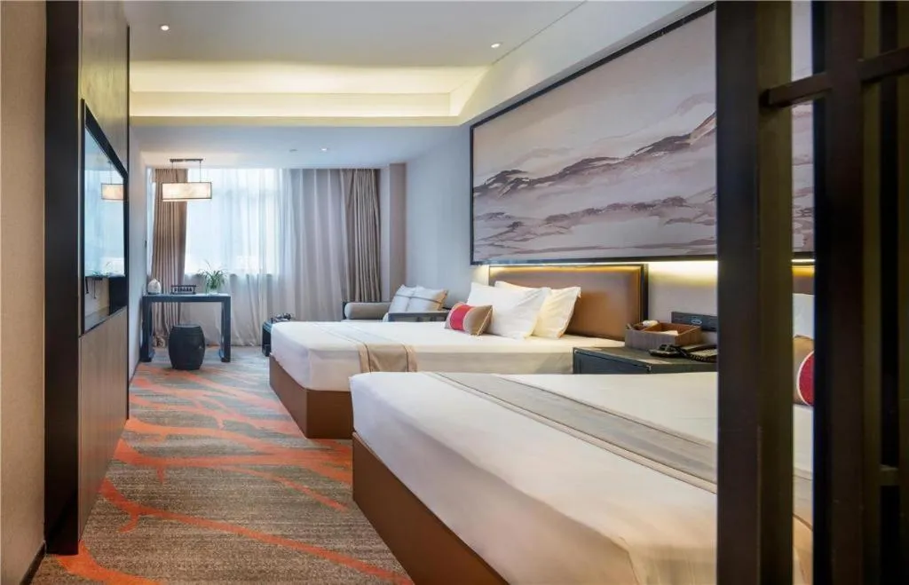 Bed in Yuan Culture Hotel Shenzhen World Shajing