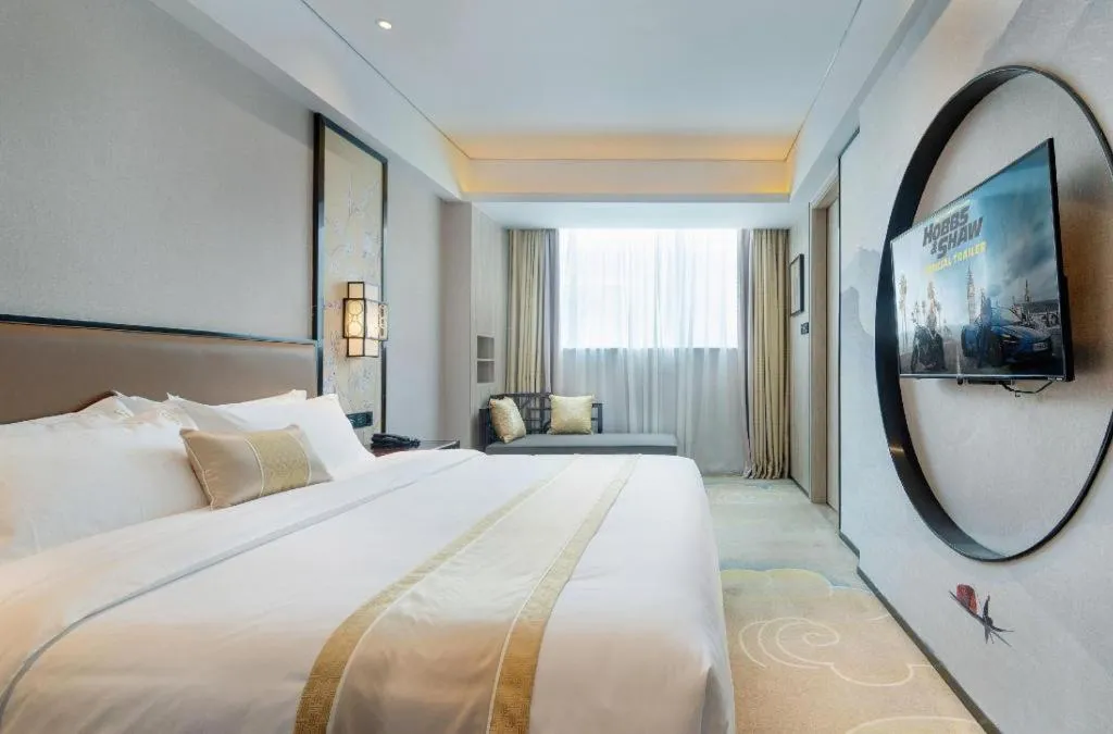 Bed in Yuan Culture Hotel Shenzhen World Shajing