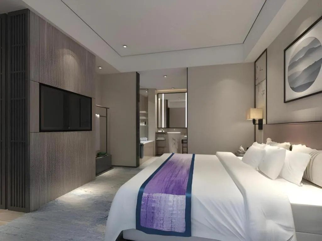 Bed in Yuan Culture Hotel Shenzhen World Shajing