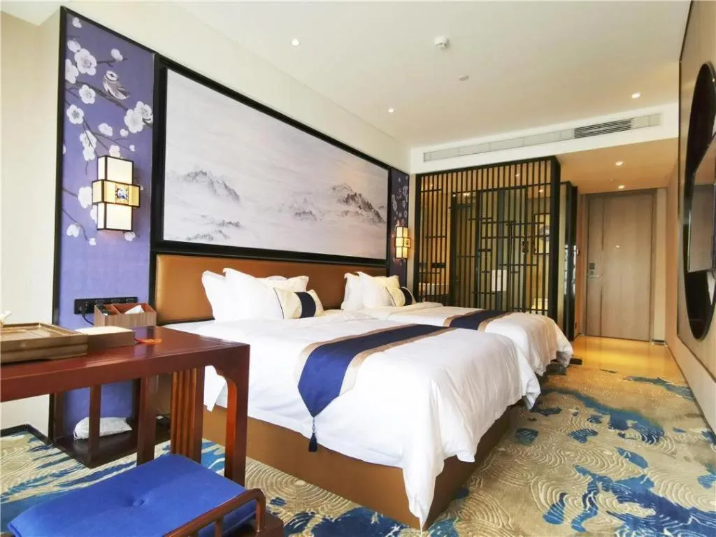 Bed in Yuan Culture Hotel Shenzhen World Shajing