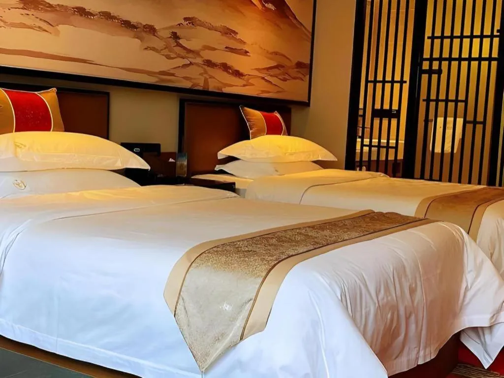 Bed in Yuan Culture Hotel Shenzhen World Shajing