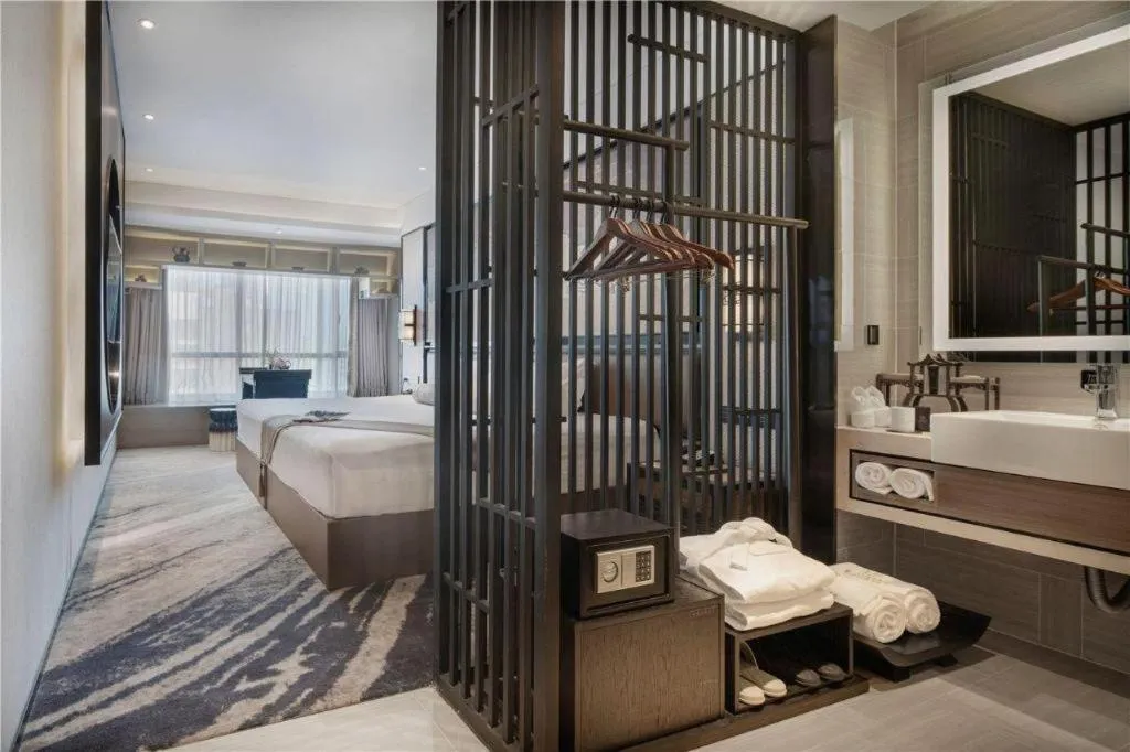 Bed in Yuan Culture Hotel Shenzhen World Shajing