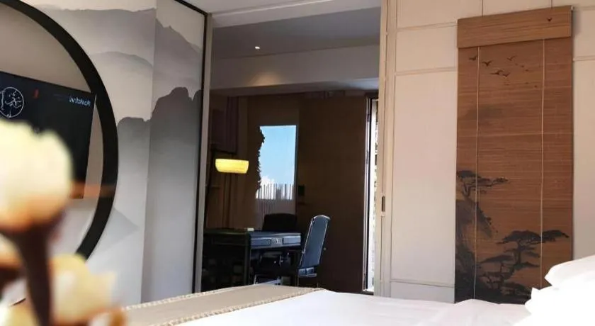 Bed in Yuan Culture Hotel Shenzhen World Shajing