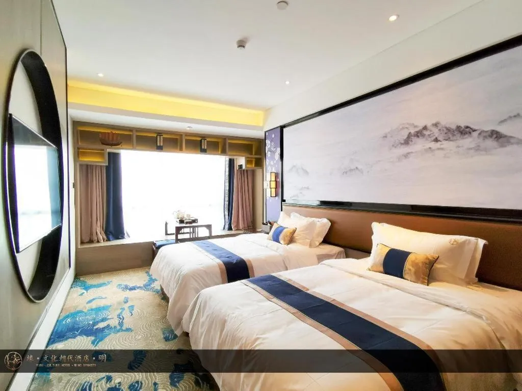 Bed in Yuan Culture Hotel Shenzhen World Shajing