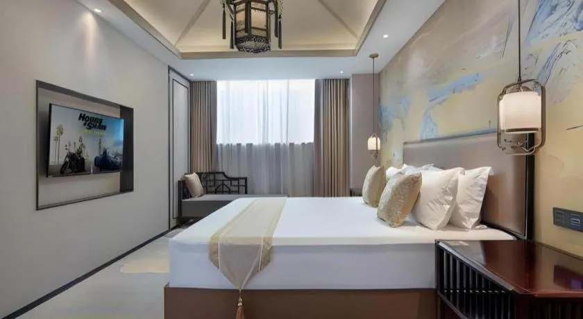 Bed in Yuan Culture Hotel Shenzhen World Shajing