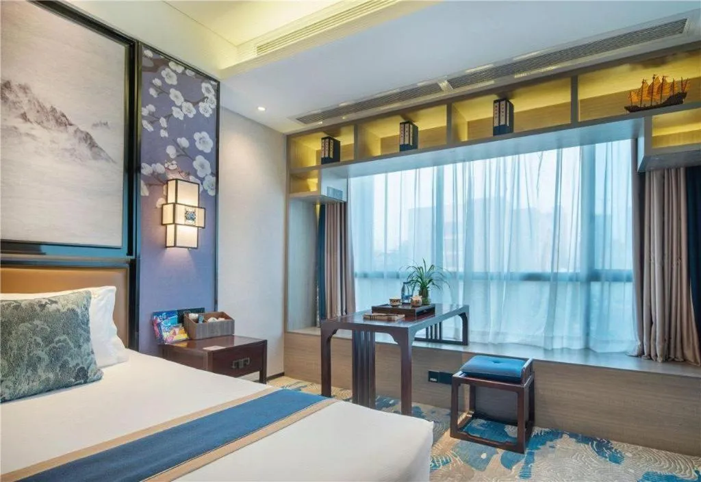 Bed in Yuan Culture Hotel Shenzhen World Shajing