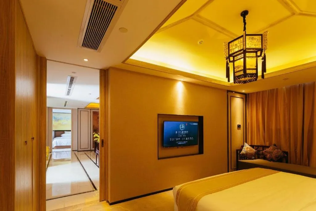 Bed in Yuan Culture Hotel Shenzhen World Shajing