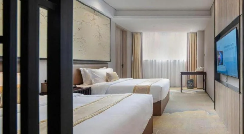 Bed in Yuan Culture Hotel Shenzhen World Shajing