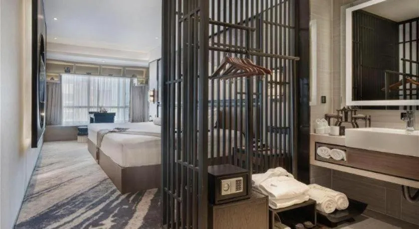 Bed in Yuan Culture Hotel Shenzhen World Shajing