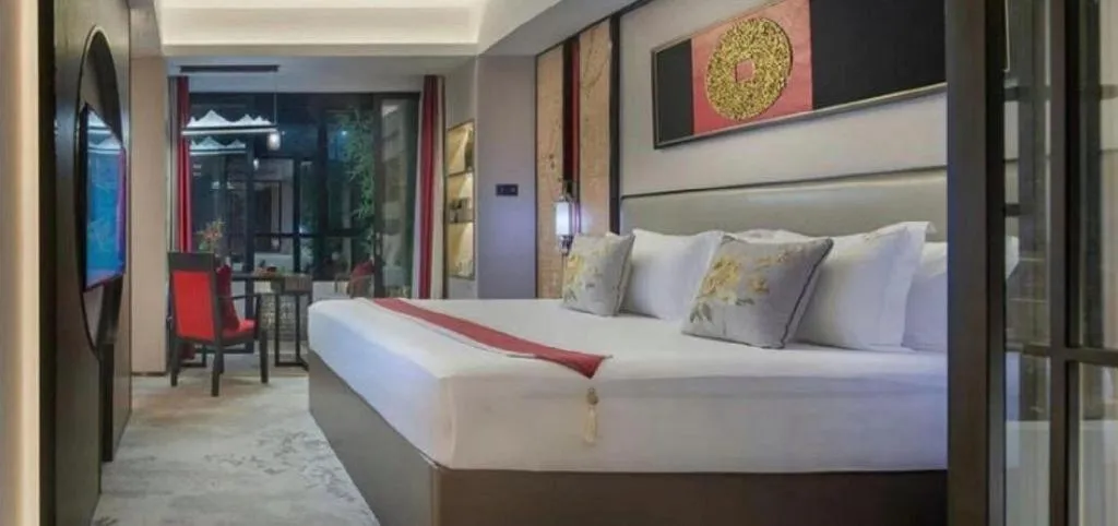 Bed in Yuan Culture Hotel Shenzhen World Shajing