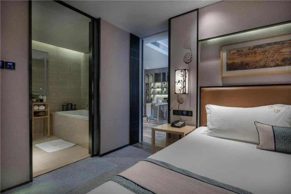 Bed in Yuan Culture Hotel Shenzhen World Shajing
