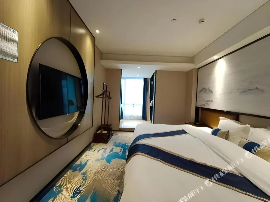 Bed in Yuan Culture Hotel Shenzhen World Shajing