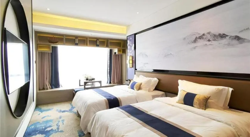 Bed in Yuan Culture Hotel Shenzhen World Shajing