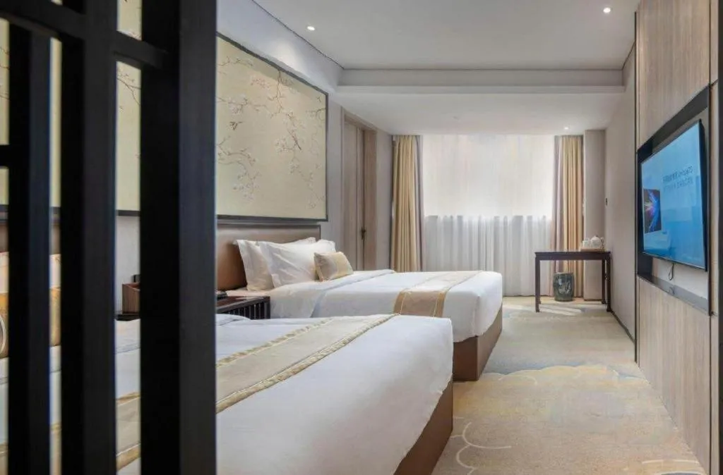 Bed in Yuan Culture Hotel Shenzhen World Shajing