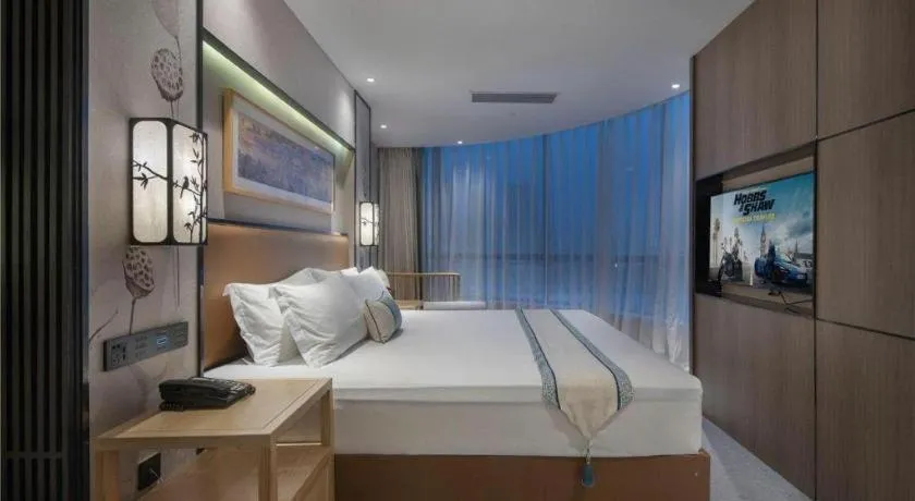 Bed in Yuan Culture Hotel Shenzhen World Shajing