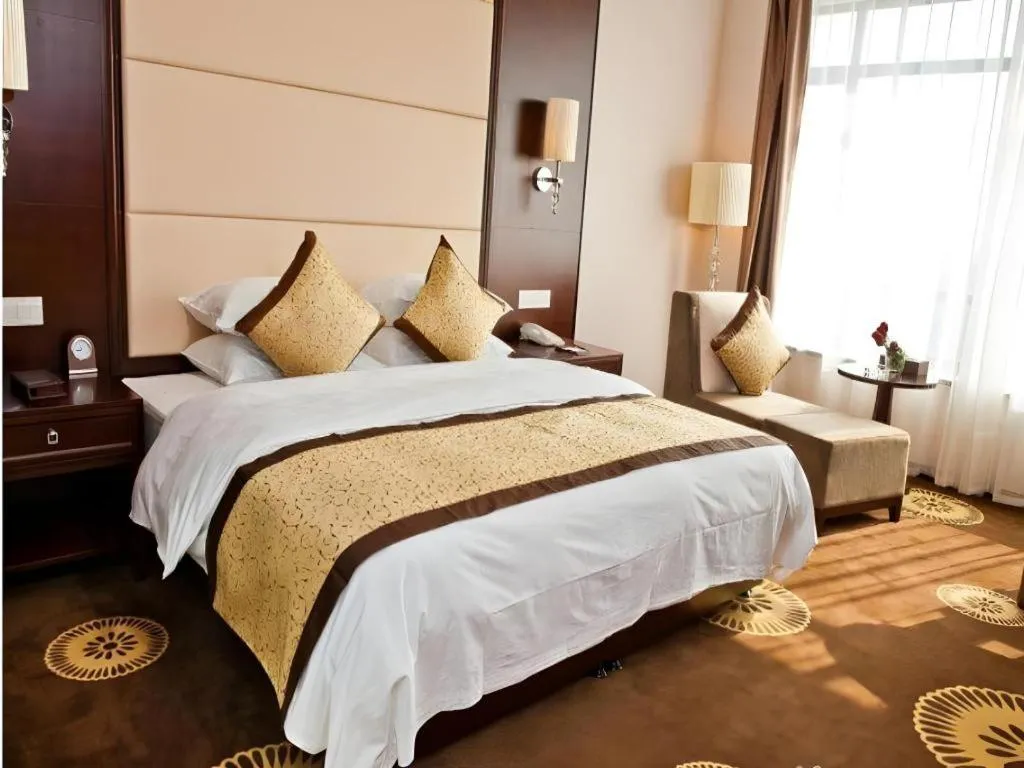 Bed in Hotel Ramada Plaza Hangzhou Xiaoshan