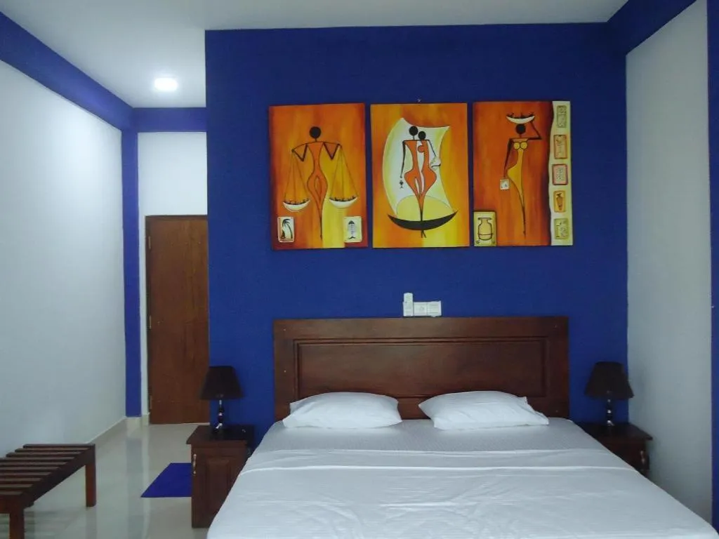 Bed in Bridge Hotel Negombo