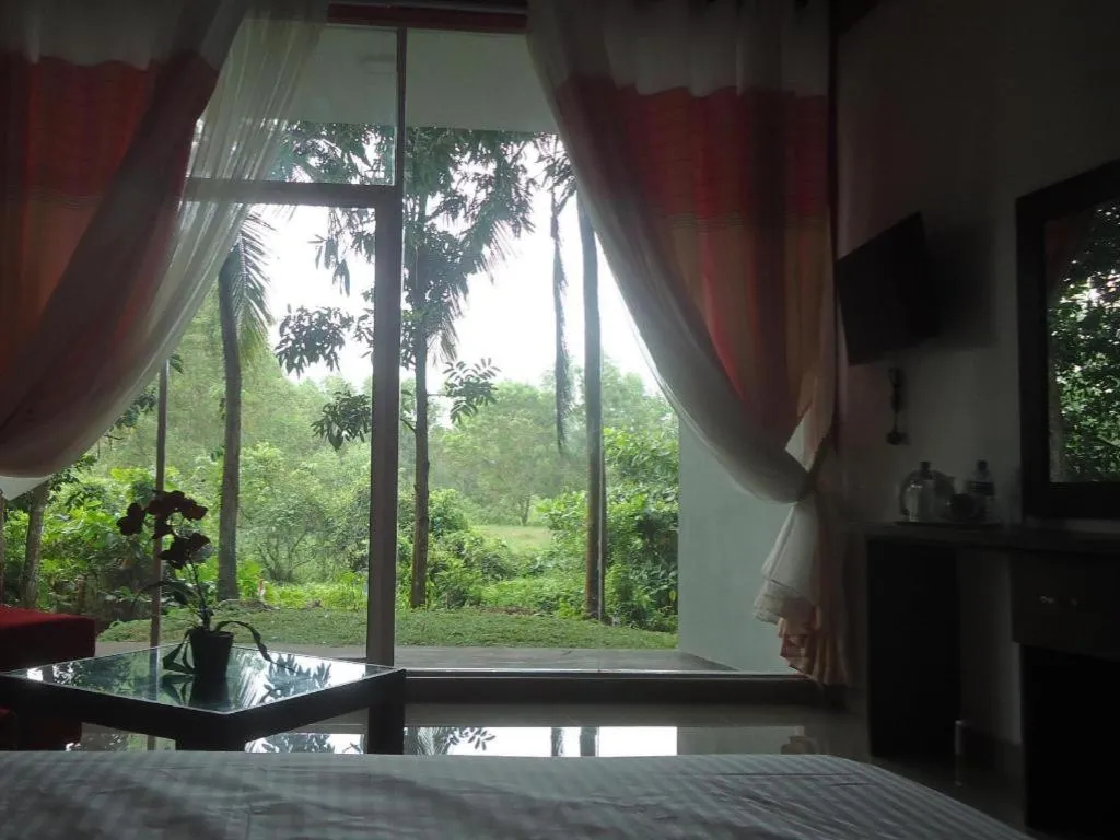 Bed in Bridge Hotel Negombo