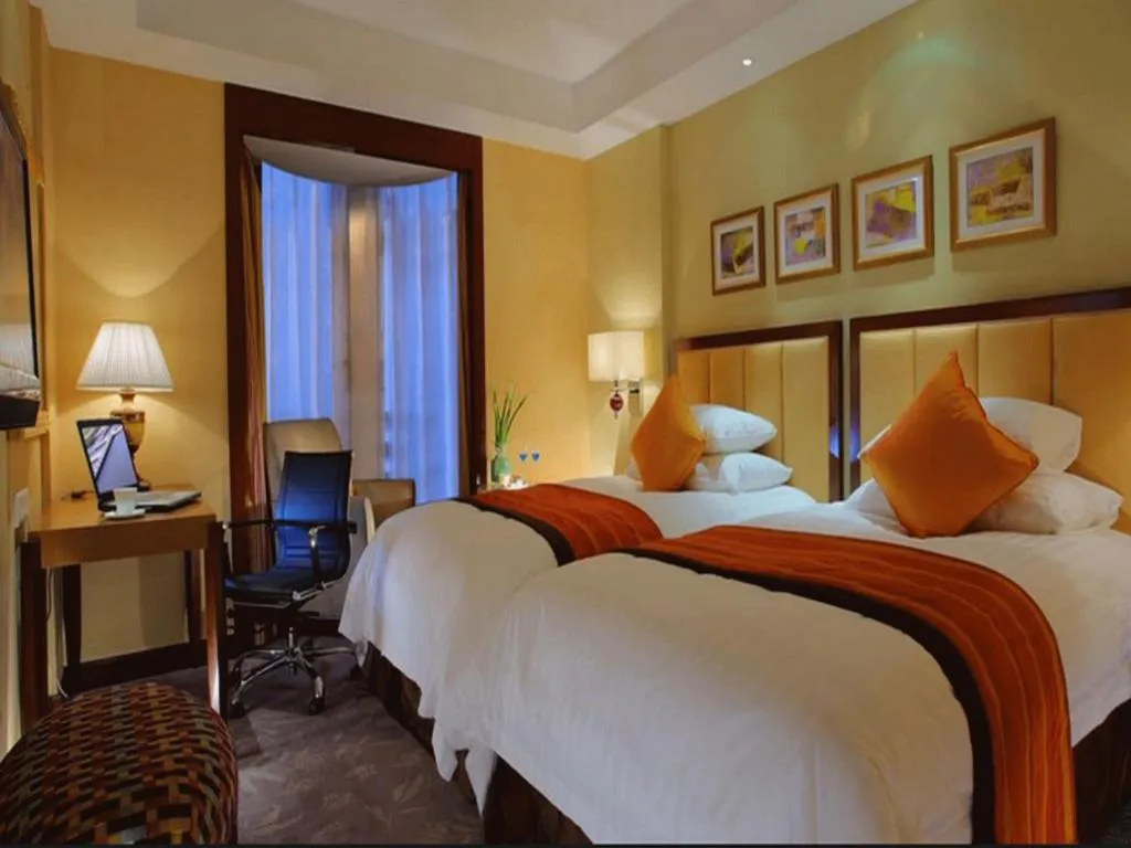 Bed in New Century Shaoxing Grand Hotel