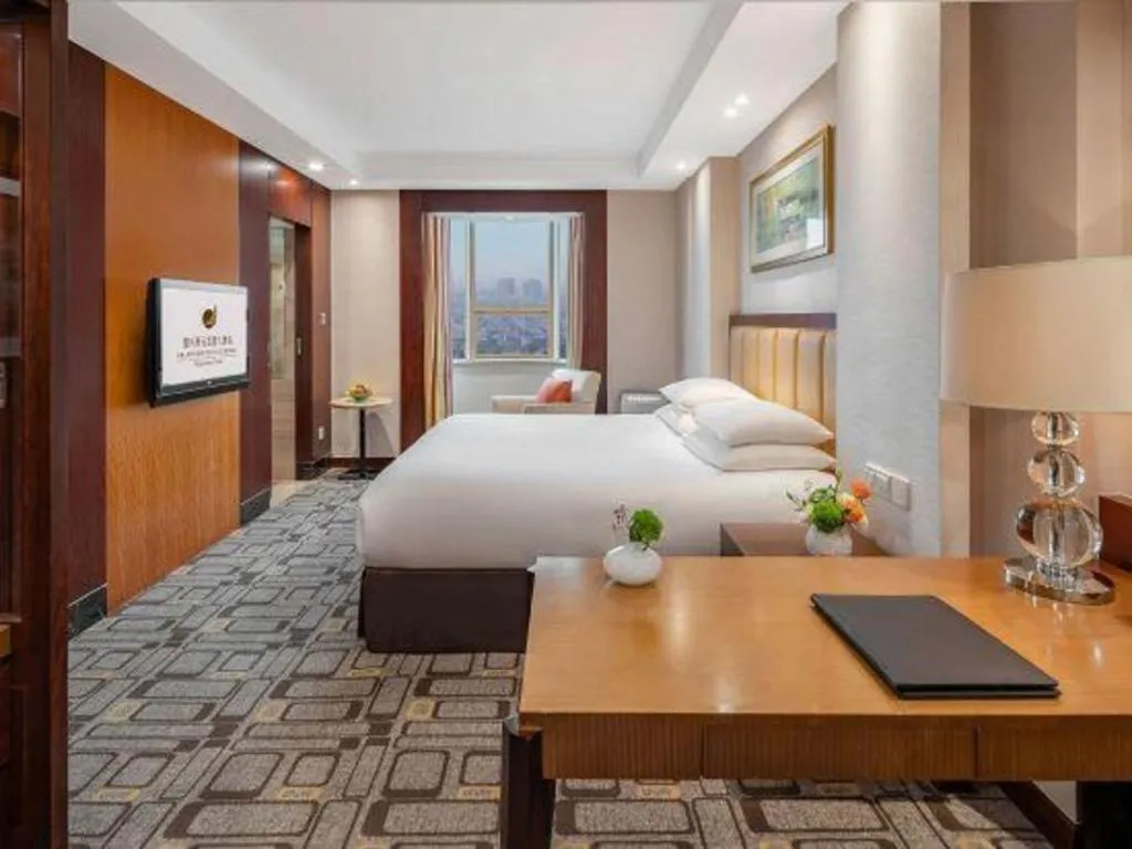Bed in New Century Shaoxing Grand Hotel